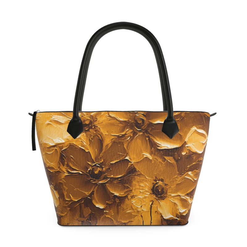 Detailansicht der strukturierten Nappa-Leder Handtasche mit kunstvoller Gemälde-Optik in Goldtönen